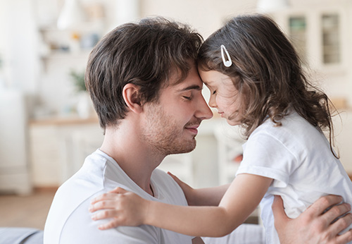 Professional lawyer at Cumberworth Law P.C. comforting a child during legal proceedings.
