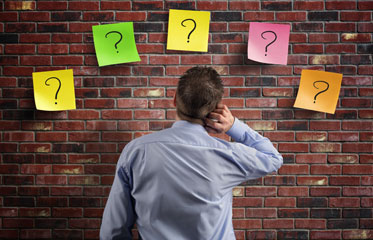 Individual considering legal options for criminal defense representation in Alabama.